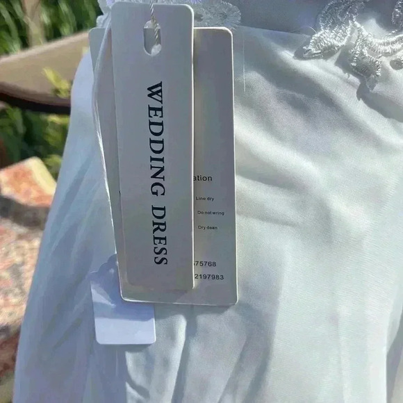 Wedding dress. Size 10. Seems to run small. - Picture 3 of 12